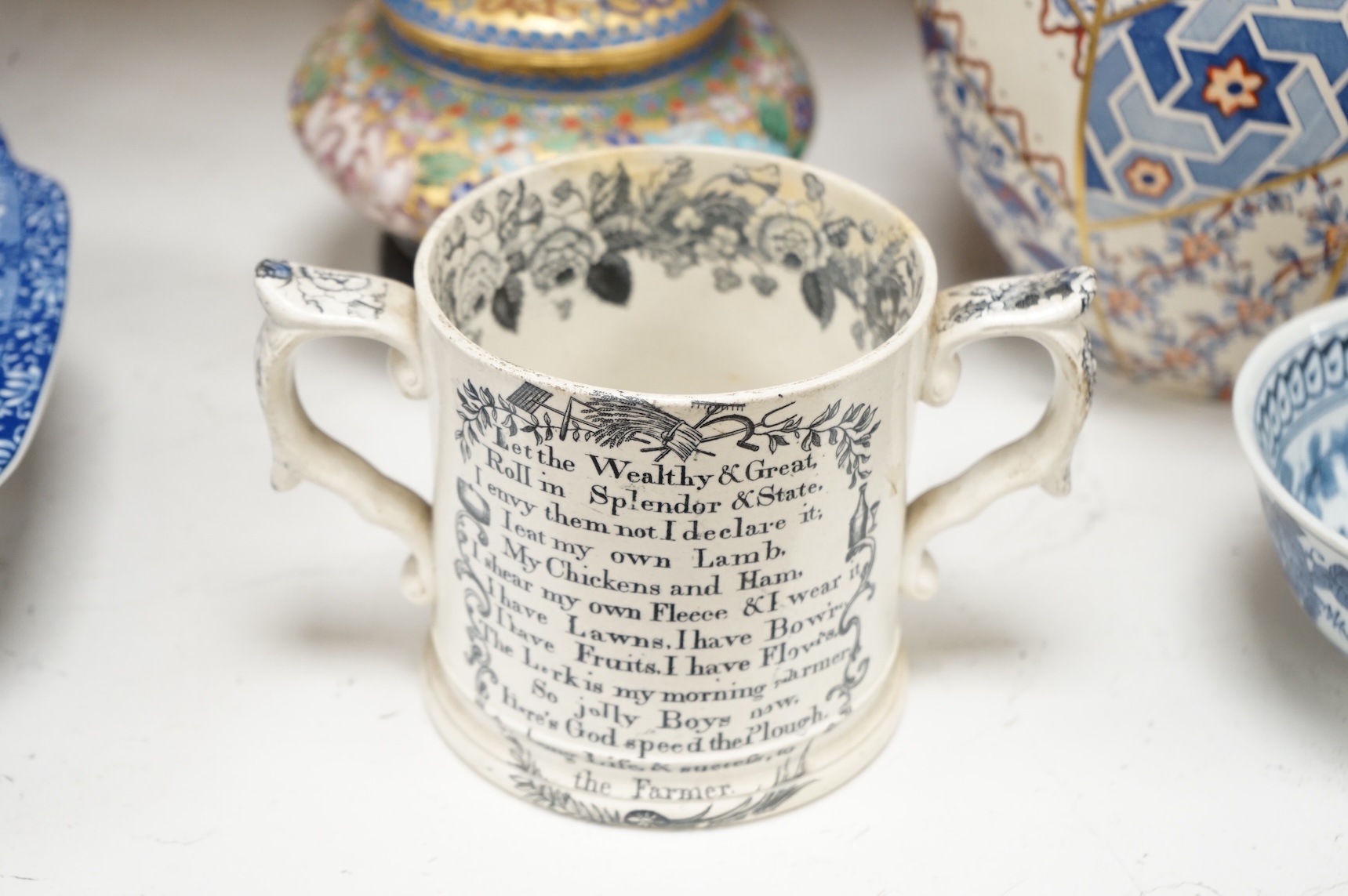 Sundry porcelain and objects to include a pair of Chinese cloisonné enamel bowls and covers, pottery twin handled printed cup and Masons vase, largest 26cm high